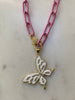 Butterfly on pink enamel