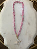 Butterfly on pink enamel